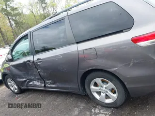 2014 Toyota Sienna LE AAS with VIN 5TDKK3DC3ES506466, listed as a IAAI auction lot 41908023 with 118,297 mi miles and . Bid and sale history available at carsss.com. Image 14.