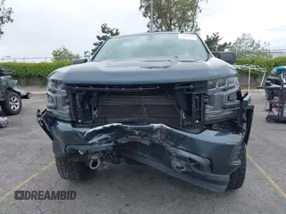 2020 Chevrolet Silverado 1500 RST with VIN 3GCPWDEDXLG277044, listed as a IAAI auction lot 42050251 with 59,708 mi miles and . Bid and sale history available at DreamBid. Image 13.