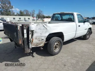 1999 Dodge Ram 2500 with VIN 3B7KC26Z0XM540263, listed as a IAAI auction lot 41939401 with 158,801 mi miles. Bid and sale history available at carsss.com. Image 4.