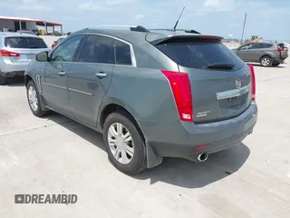 2013 Cadillac SRX Luxury Collection z VIN 3GYFNCE39DS542125, wystawiony jako IAAI lot #42067672 z przebiegiem 158 013 mil mil oraz . Historia ofert i sprzedaży dostępna na DreamBid. Obrazek 3.