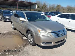 2009 Toyota Avalon XL with VIN 4T1BK36BX9U328993, listed as a IAAI auction lot 41778999 with 355,507 mi miles. Bid and sale history available at carsss.com. Image 1.