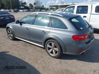 2014 Audi allroad Premium Plus with VIN WA1UFAFL7EA006011, listed as a IAAI auction lot 41494881 with 70,461 mi miles. Bid and sale history available at carsss.com. Image 3.