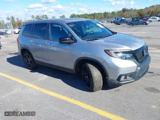 2021 Honda Passport Sport with VIN 5FNYF7H23MB006964, listed as a IAAI auction lot 40898325 with 70,072 mi miles. Bid and sale history available at carsss.com. Image 1.