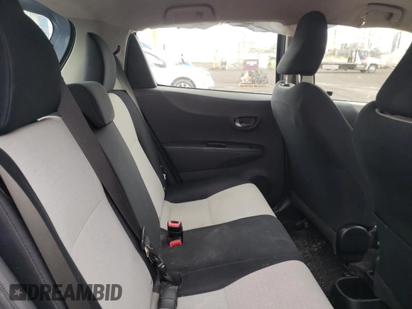 2012 Toyota Yaris L with VIN JTDKTUD33CD517298, listed as a Copart auction lot 52099335 with Not Provided miles and Salvage Title. Bid and sale history available at DreamBid. Image 10.