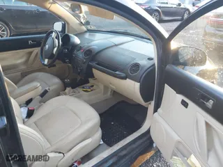 2010 Volkswagen New Beetle Coupe with VIN 3VWRG3AG9AM013681, listed as a IAAI auction lot 41177108 with 104,139 mi miles. Bid and sale history available at carsss.com. Image 5.