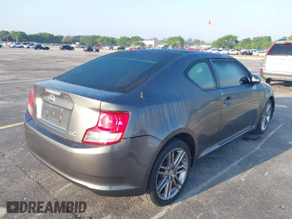 2012 Scion tC with VIN JTKJF5C74C3026945, listed as a IAAI auction lot 41757437 with 104,039 mi miles. Bid and sale history available at carsss.com. Image 6.