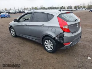 2014 Hyundai Accent GS with VIN KMHCT5AE3EU176306, listed as a IAAI auction lot 41572325 with 179,277 mi miles. Bid and sale history available at carsss.com. Image 3.