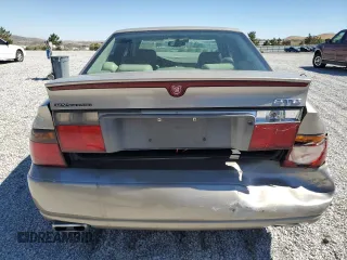 2000 Cadillac Seville Touring STS z VIN 1G6KY5498YU255607, wystawiony jako Copart lot #71130714 z przebiegiem 146 046 mil mil oraz Szkoda całkowita • Salvage title. Historia ofert i sprzedaży dostępna na DreamBid. Obrazek 6.