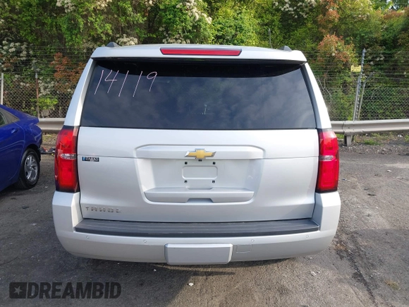 2019 Chevrolet Tahoe LT with VIN 1GNSCBKCXKR219413, listed as a IAAI auction lot 42013260 with 92,886 mi miles and . Bid and sale history available at DreamBid. Image 17.