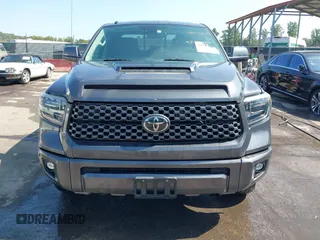 2018 Toyota Tundra SR z VIN 5TFUY5F19JX775462, wystawiony jako IAAI lot #34435962 z przebiegiem 44 563 mil mil oraz . Historia ofert i sprzedaży dostępna na DreamBid. Obrazek 12.