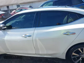 2016 Nissan Maxima SL z VIN 1N4AA6AP8GC413489, wystawiony jako IAAI lot #41899453 z przebiegiem 133 823 mil mil oraz . Historia ofert i sprzedaży dostępna na DreamBid. Obrazek 14.