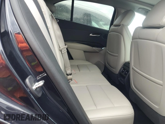 2022 Cadillac XT4 FWD Premium Luxury z VIN 1GYFZCR44NF166169, wystawiony jako Copart lot #77981414 z przebiegiem 9 734 mil mil oraz Nie do naprawy • Non repairable. Historia ofert i sprzedaży dostępna na DreamBid. Obrazek 11.