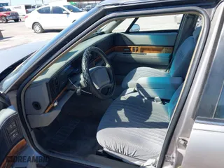 1995 Buick LeSabre Custom with VIN 1G4HP52L5SH487893, listed as a IAAI auction lot 41680378 with 121,742 mi miles. Bid and sale history available at carsss.com. Image 5.