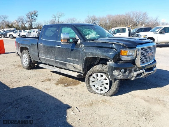 2017 GMC Sierra 2500HD Denali with VIN 1GT12UEY5HF118445, listed as a IAAI auction lot 41327986 with 158,970 mi miles. Bid and sale history available at carsss.com. Image 1.