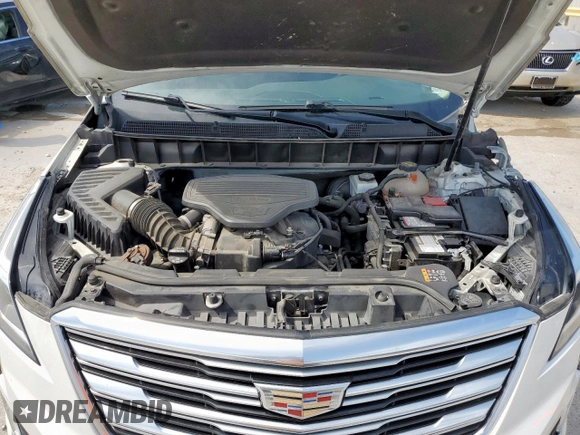 2018 Cadillac XT5 Premium Luxury AWD z VIN 1GYKNFRS7JZ239389, wystawiony jako Copart lot #56503575 z przebiegiem 137 222 mil mil oraz Szkoda całkowita • Salvage title. Historia ofert i sprzedaży dostępna na DreamBid. Obrazek 12.