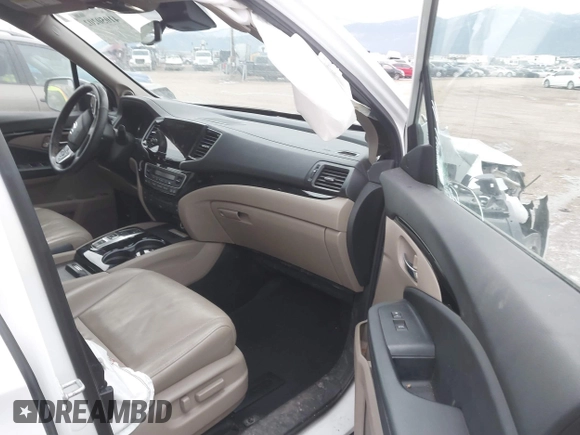 2021 Honda Pilot Elite with VIN 5FNYF6H03MB044154, listed as a IAAI auction lot 41050202 with 60,331 mi miles and . Bid and sale history available at DreamBid. Image 5.