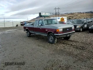 1990 Ford F-250 with VIN 1FTHX26H9LKA97005, listed as a Copart auction lot 86840874 with 111,275 mi miles and Salvage title. Bid and sale history available at DreamBid. Image 10.