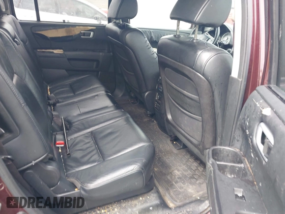 2010 Honda Pilot Touring with VIN 5FNYF4H95AB040721, listed as a IAAI auction lot 41928412 with 213,219 mi miles and . Bid and sale history available at carsss.com. Image 8.