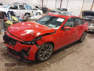 2020 Cadillac CT5 Sport z VIN 1G6DU5RK0L0119150, wystawiony jako IAAI lot #41531397 z przebiegiem 65 329 mil mil oraz . Historia ofert i sprzedaży dostępna na DreamBid. Obrazek 2.