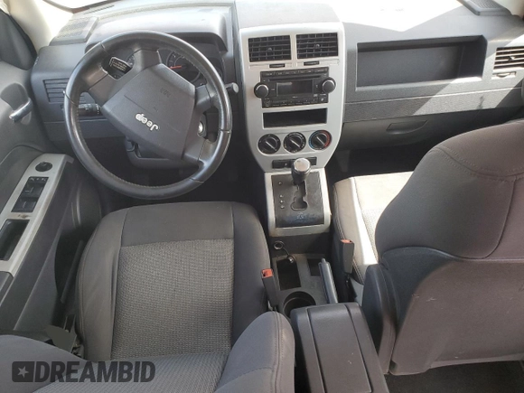 2008 Jeep Patriot Sport with VIN 1J8FT28W18D799581, listed as a Copart auction lot 50605455 with 142,809 mi miles and Salvage Title. Bid and sale history available at carsss.com. Image 8.