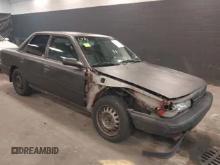 1990 Toyota Camry z VIN 4T1VV22E7LU030830, wystawiony jako IAAI lot #41971964 z przebiegiem 164 488 mil mil oraz . Historia ofert i sprzedaży dostępna na DreamBid. Obrazek 1.