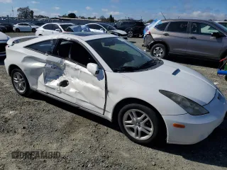2000 Toyota Celica GT with VIN JTDDR32TXY0025709, listed as a Copart auction lot 46736585 with 184,635 mi miles and Salvage Title. Bid and sale history available at carsss.com. Image 4.