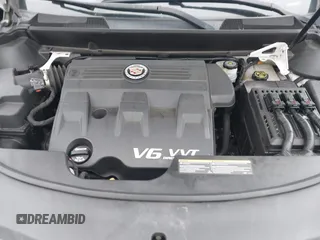 2013 Cadillac SRX Performance Collection with VIN 3GYFNHE34DS628486, listed as a IAAI auction lot 42530124 with 76,778 mi miles and . Bid and sale history available at DreamBid. Image 10.