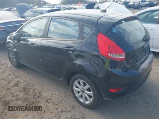 2013 Ford Fiesta SE with VIN 3FADP4EJ7DM140755, listed as a IAAI auction lot 41908366 with 68,744 mi miles. Bid and sale history available at carsss.com. Image 3.