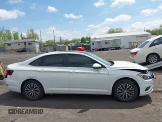 2020 Volkswagen Jetta S z VIN 3VWC57BU2LM078947, wystawiony jako IAAI lot #42181277 z przebiegiem 28 292 mil mil oraz . Historia ofert i sprzedaży dostępna na DreamBid. Obrazek 13.