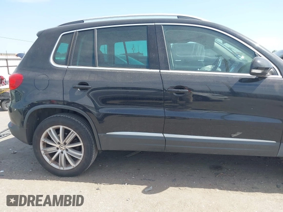 2012 Volkswagen Tiguan SE with VIN WVGAV7AX6CW521960, listed as a IAAI auction lot 42249355 with 118,496 mi miles and . Bid and sale history available at DreamBid. Image 13.