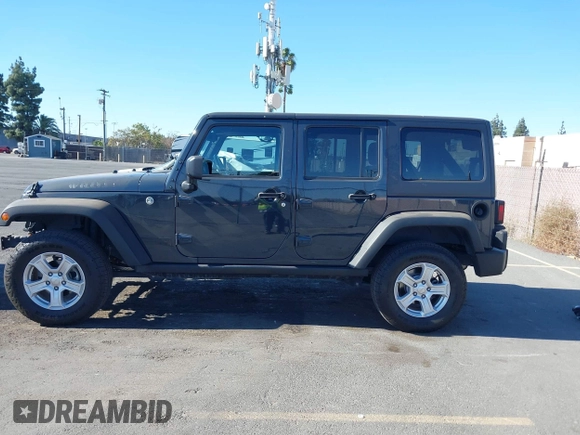 2018 Jeep Wrangler JK Unlimited Sport S with VIN 1C4BJWDG4JL868700, listed as a IAAI auction lot 41349566 with 68,539 mi miles. Bid and sale history available at carsss.com. Image 14.