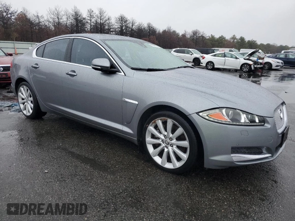 2013 Jaguar XF V6 SC with VIN SAJWJ0EF5D8S76767, listed as a Copart auction lot 80329174 with 100,519 mi miles and Salvage Title. Bid and sale history available at carsss.com. Image 4.