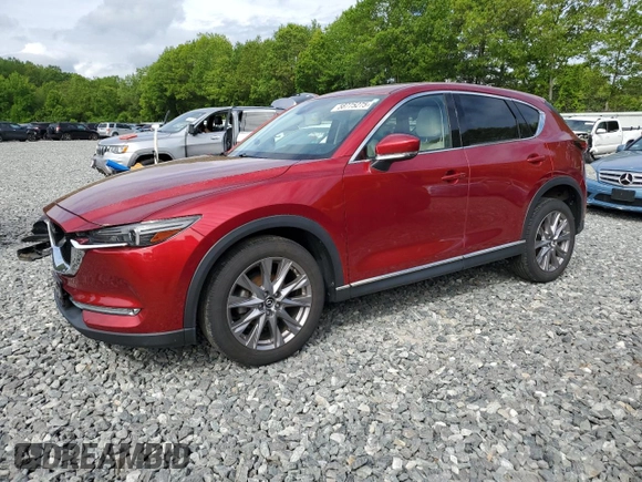 2019 Mazda CX-5 Grand Touring with VIN JM3KFBDM1K0559891, listed as a Copart auction lot 58775275 with 45,126 mi miles and Salvage title. Bid and sale history available at DreamBid. Image 1.
