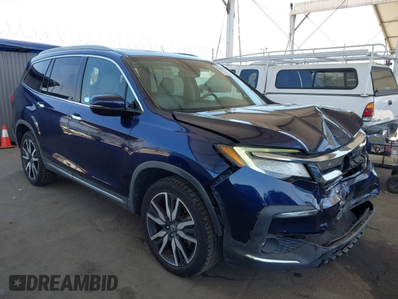 2019 Honda Pilot Touring 8-Passenger z VIN 5FNYF5H97KB013530, wystawiony jako IAAI lot #42403449 z przebiegiem 90 557 mil mil oraz . Historia ofert i sprzedaży dostępna na DreamBid. Obrazek 1.