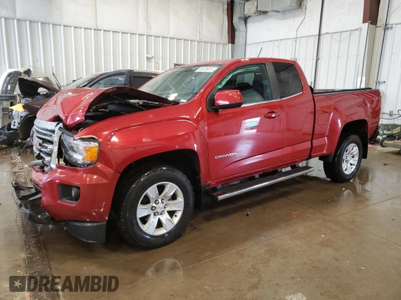 2015 GMC Canyon 4WD SLE with VIN 1GTH6BE38F1243073, listed as a Copart auction lot 53676815 with 142,938 mi miles and Non repairable. Bid and sale history available at DreamBid. Image 1.