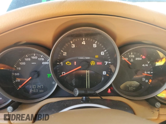 2006 Porsche 911 Carrera with VIN WP0CA29976S756591, listed as a Copart auction lot 77962404 with 110,147 mi miles and Salvage Title. Bid and sale history available at DreamBid. Image 9.