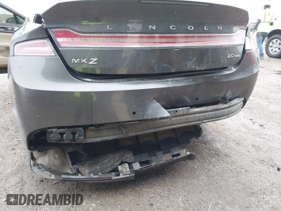 2015 Lincoln MKZ z VIN 3LN6L2G99FR604894, wystawiony jako IAAI lot #41433264 z przebiegiem 262 472 mil mil oraz . Historia ofert i sprzedaży dostępna na DreamBid. Obrazek 6.