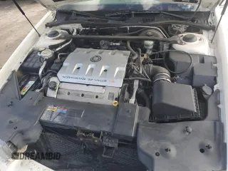 2001 Cadillac Eldorado Touring ETC z VIN 1G6ET12941B101128, wystawiony jako Copart lot #73832624 z przebiegiem Nie podano mil oraz Nie do naprawy. Historia ofert i sprzedaży dostępna na DreamBid. Obrazek 11.
