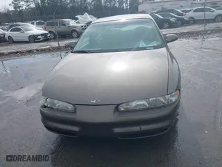 2000 Oldsmobile Intrigue GLS with VIN 1G3WX52H9YF131166, listed as a IAAI auction lot 41527895 with 104,534 mi miles. Bid and sale history available at carsss.com. Image 12.