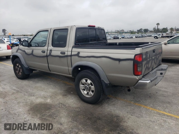 2000 Nissan Frontier XE with VIN 1N6ED27T8YC357939, listed as a Copart auction lot 55727395 with 143,842 mi miles and Salvage title. Bid and sale history available at DreamBid. Image 2.