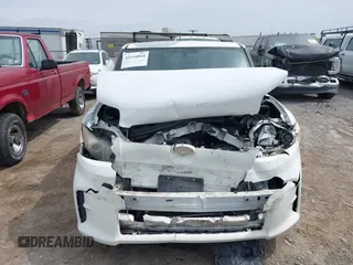 2012 Scion xB with VIN JTLZE4FE4CJ004977, listed as a IAAI auction lot 42116864 with 119,206 mi miles. Bid and sale history available at carsss.com. Image 6.