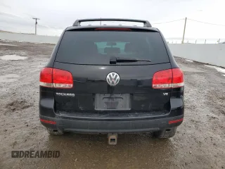 2004 Volkswagen Touareg z VIN WVGBC77LX4D062055, wystawiony jako Copart lot #45960445 z przebiegiem 201 819 mil mil oraz Szkoda całkowita • Salvage title. Historia ofert i sprzedaży dostępna na DreamBid. Obrazek 6.