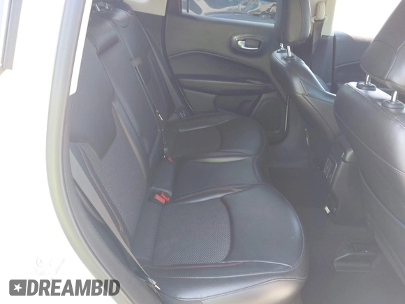2021 Jeep Compass Trailhawk with VIN 3C4NJDDB7MT564467, listed as a IAAI auction lot 42330939 with 76,963 mi miles and . Bid and sale history available at DreamBid. Image 8.