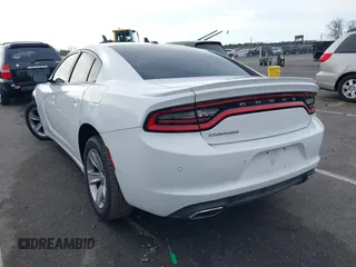 2015 Dodge Charger SE z VIN 2C3CDXBG6FH874656, wystawiony jako IAAI lot #41886805 z przebiegiem 121 568 mil mil oraz . Historia ofert i sprzedaży dostępna na DreamBid. Obrazek 3.