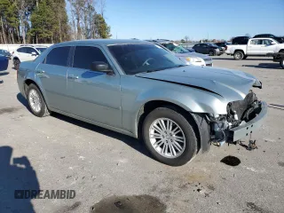 2005 Chrysler 300 with VIN 2C3JA43R95H168570, listed as a Copart auction lot 87672695 with 82,171 mi miles and Salvage Title. Bid and sale history available at carsss.com. Image 4.