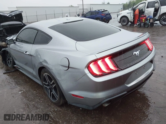 2020 Ford Mustang EcoBoost with VIN 1FA6P8TH3L5111659, listed as a IAAI auction lot 42115879 with 93,928 mi miles and . Bid and sale history available at DreamBid. Image 3.