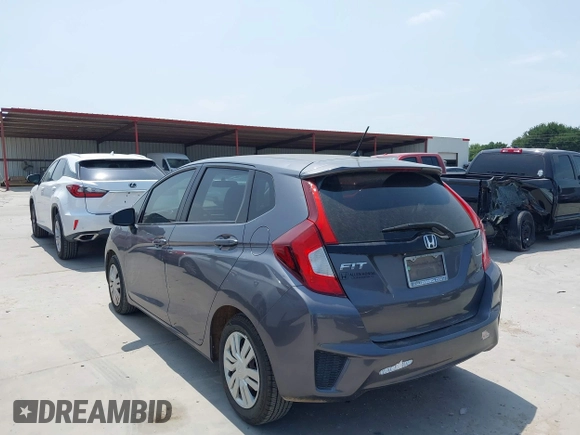 2015 Honda Fit LX with VIN 3HGGK5H55FM724750, listed as a IAAI auction lot 42282137 with 32,696 mi miles and . Bid and sale history available at DreamBid. Image 3.