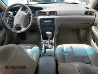 2000 Toyota Camry CE z VIN 4T1BG22KXYU639808, wystawiony jako Copart lot #56606985 z przebiegiem 119 678 mil mil oraz Szkoda całkowita • Salvage title. Historia ofert i sprzedaży dostępna na DreamBid. Obrazek 8.