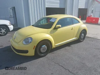 2013 Volkswagen Beetle 2.5L with VIN 3VWHX7AT7DM613197, listed as a IAAI auction lot 41298890 with 130,219 mi miles and . Bid and sale history available at DreamBid. Image 19.