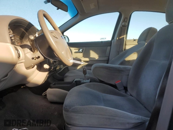 2000 Ford Taurus SE with VIN 1FAFP53U7YG259840, listed as a Copart auction lot 42412595 with 125,226 mi miles and Salvage Title. Bid and sale history available at DreamBid. Image 7.